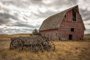 Abandoned barn and wagon on the backroads of Saskatchewan